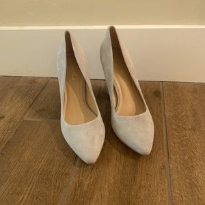 Light grey shoes with about a 3” heel.